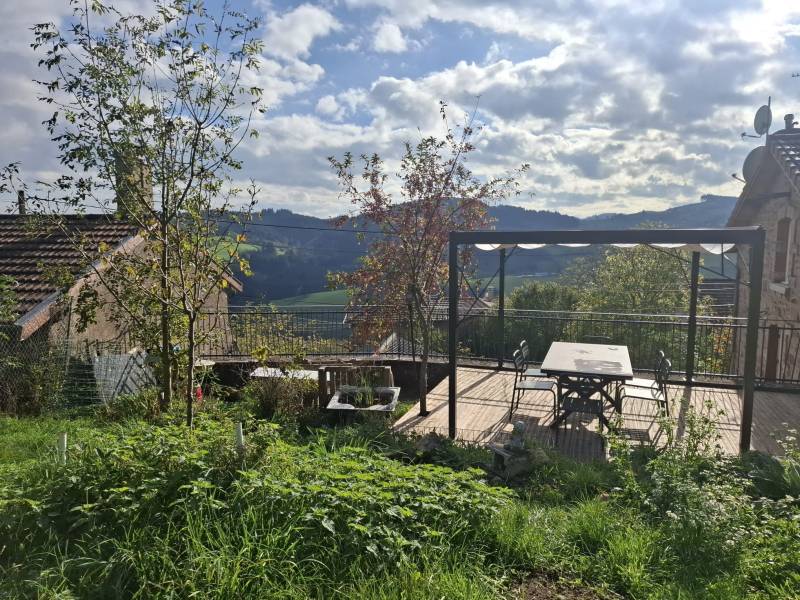 Transformation des espaces extérieurs sur mesure à Grandris